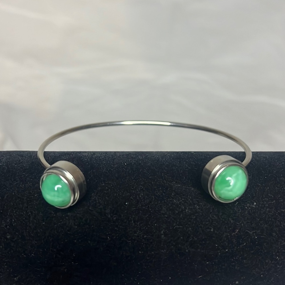 Silver bangle with jade snaps